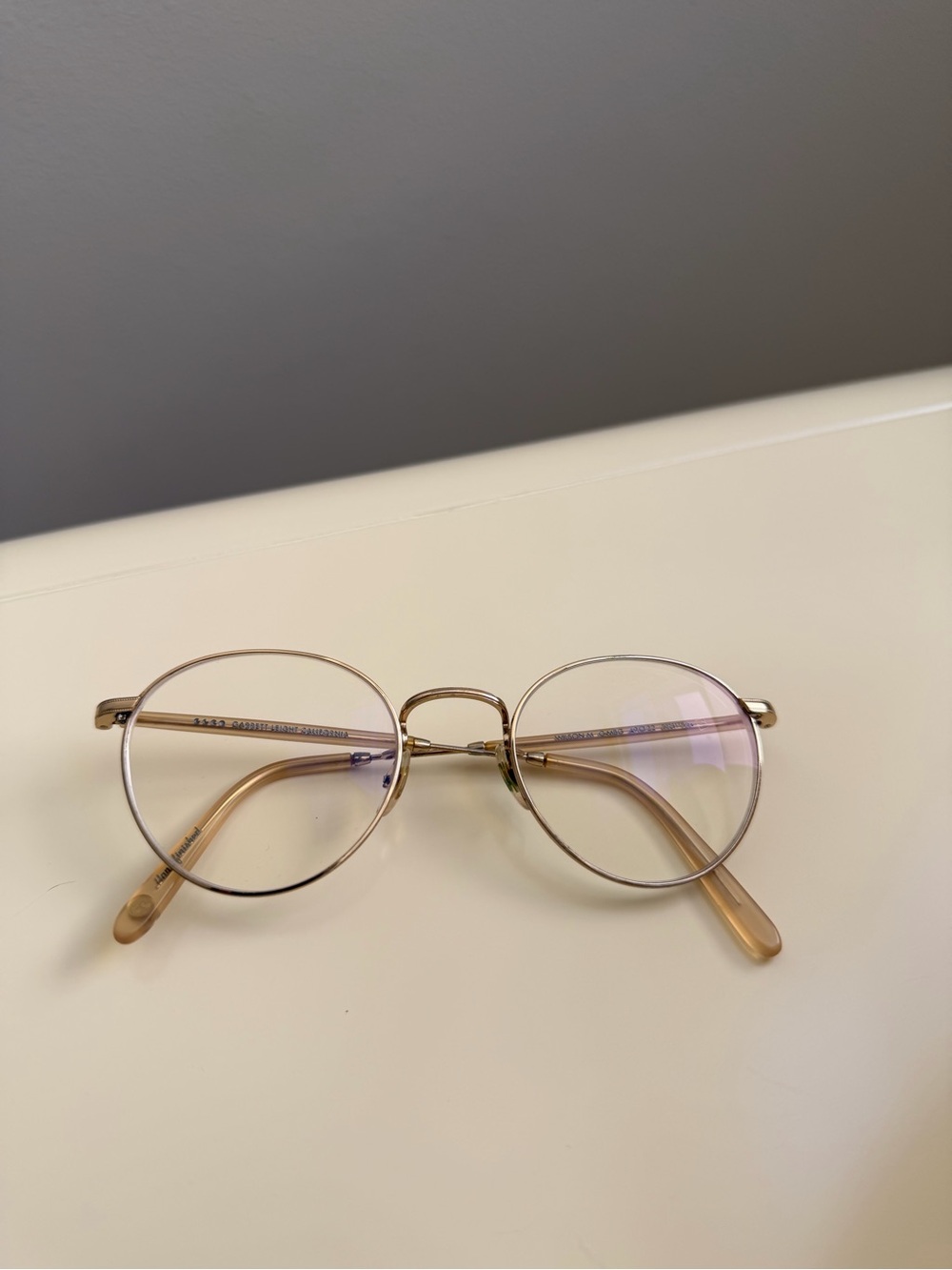 Garrett Leight Round Gold Metal Frame Glasses with Light Brown Temples